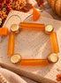Amber-orange and textured gold-tone geometric bracelet