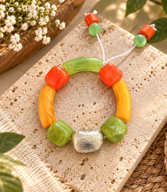 Colorful adjustable bracelet with orange, green, yellow and silver beads