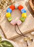Colorful adjustable bracelet with coral, blue, yellow, green and blush beads