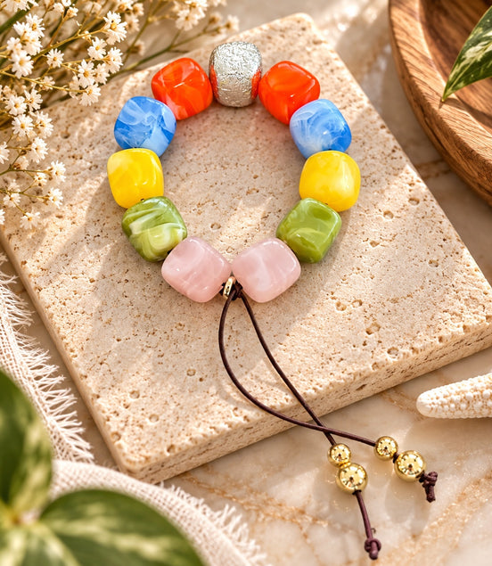 Colorful adjustable bracelet with coral, blue, yellow, green and blush beads