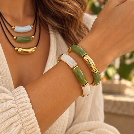 Matching bracelets worn on arm
